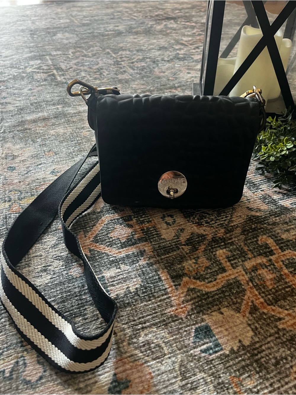 MOOST Black Quilted Crossbody Bag with Striped Strap